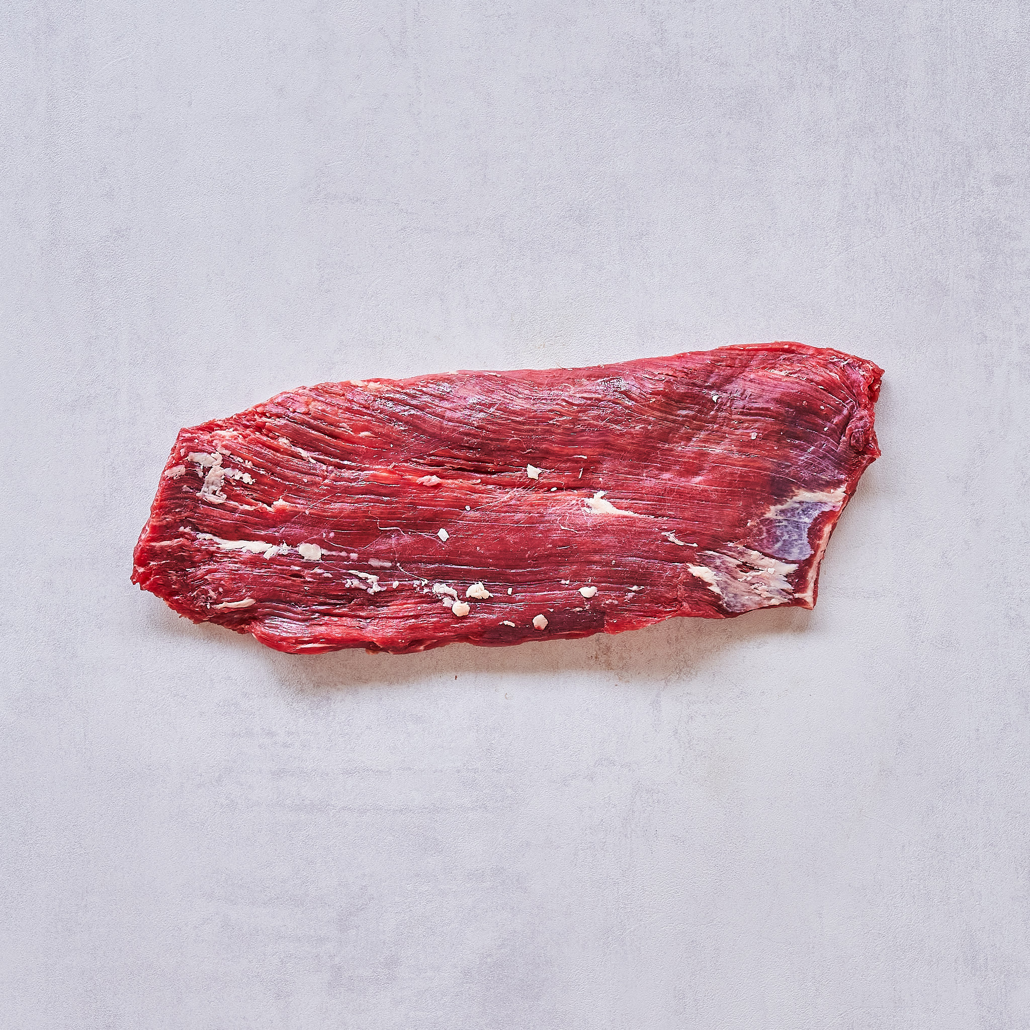 Dry Aged Flanksteak Cut auf weissem Hintergrund