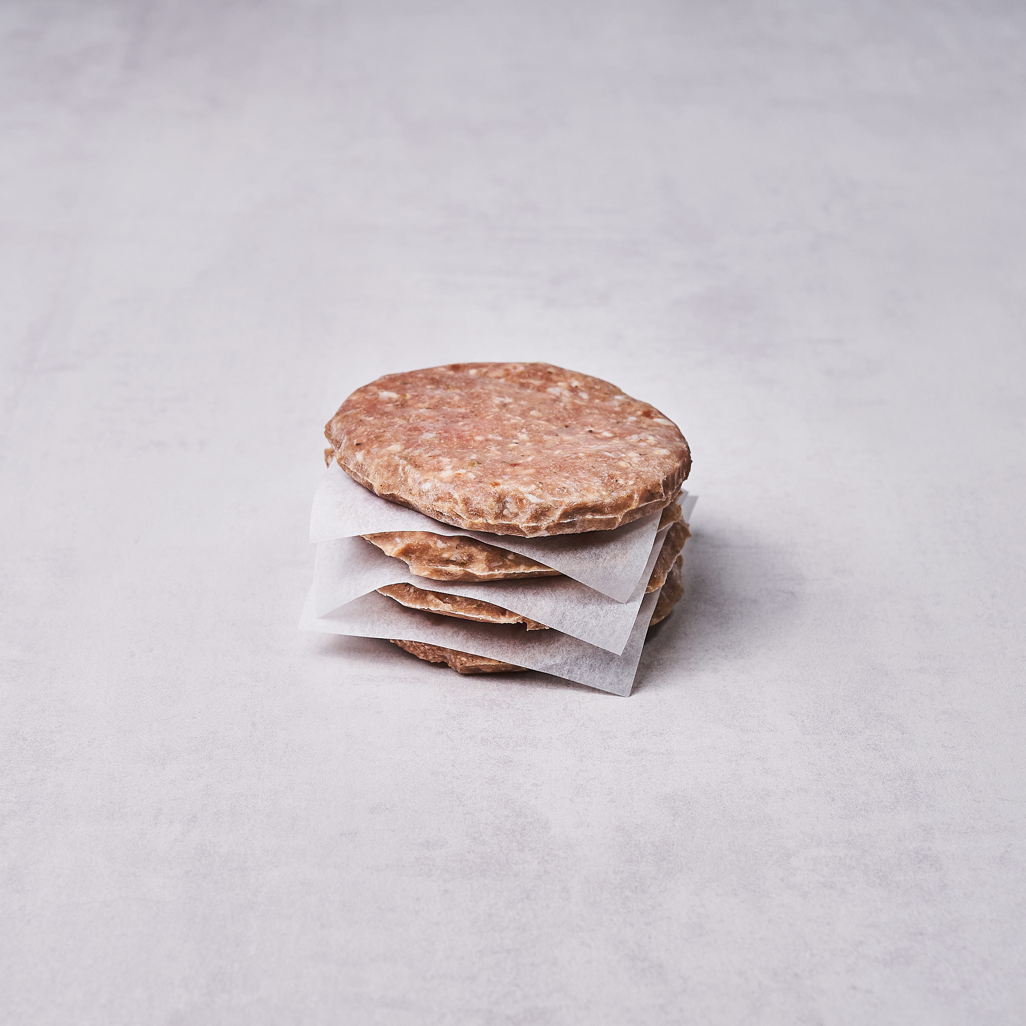 Vier Burgerpatties vom Milchkalb