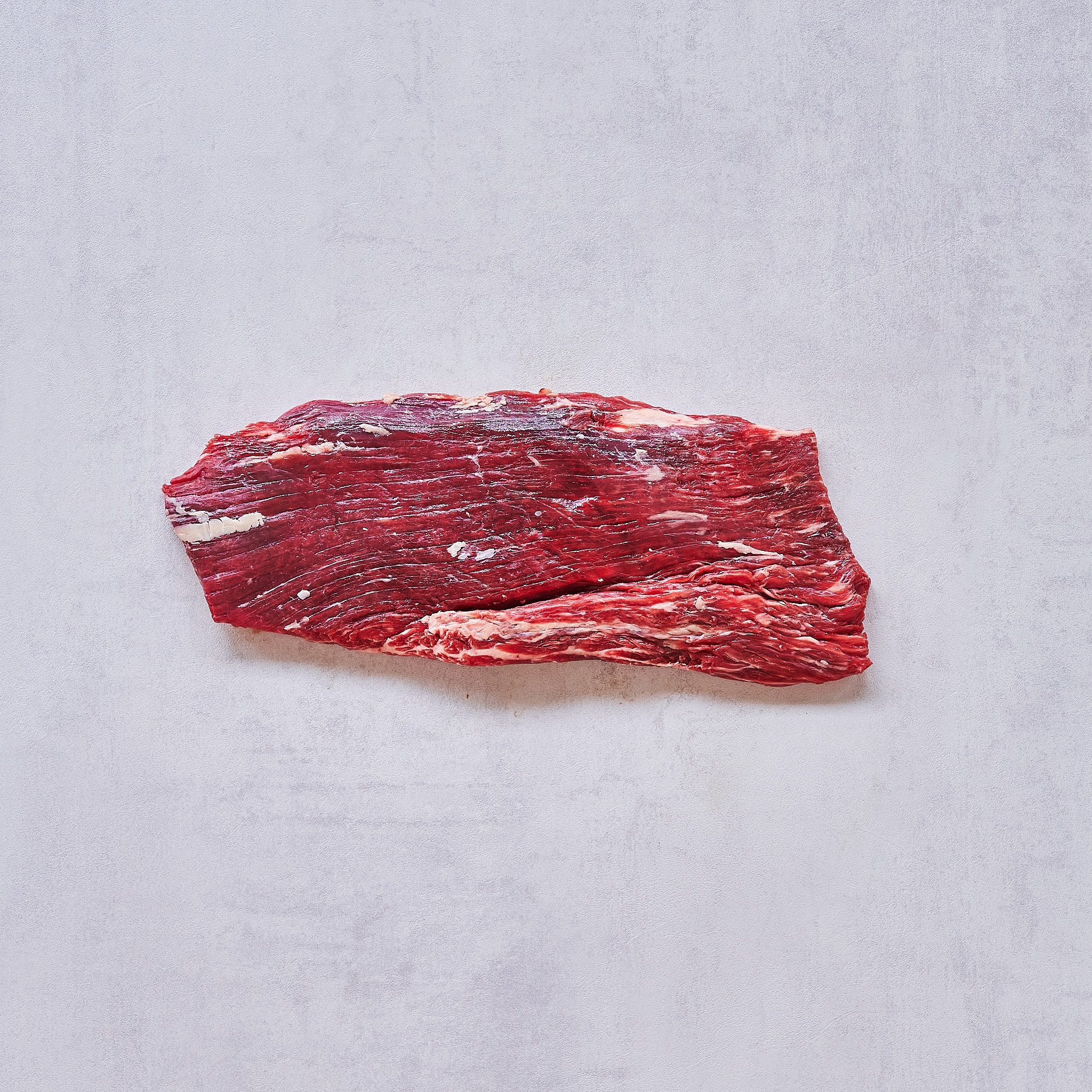 Dry Aged Flanksteak Cut auf weissem Hintergrund