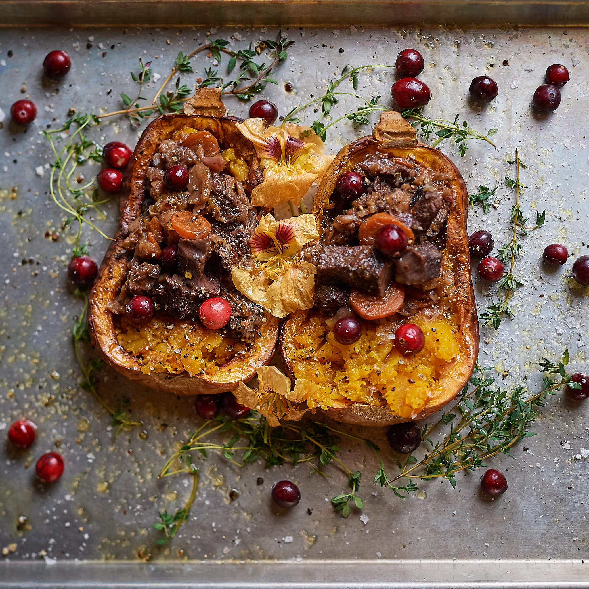 Rindsbackerl gebraten und serviert im Kuerbis mit frischem Thymian