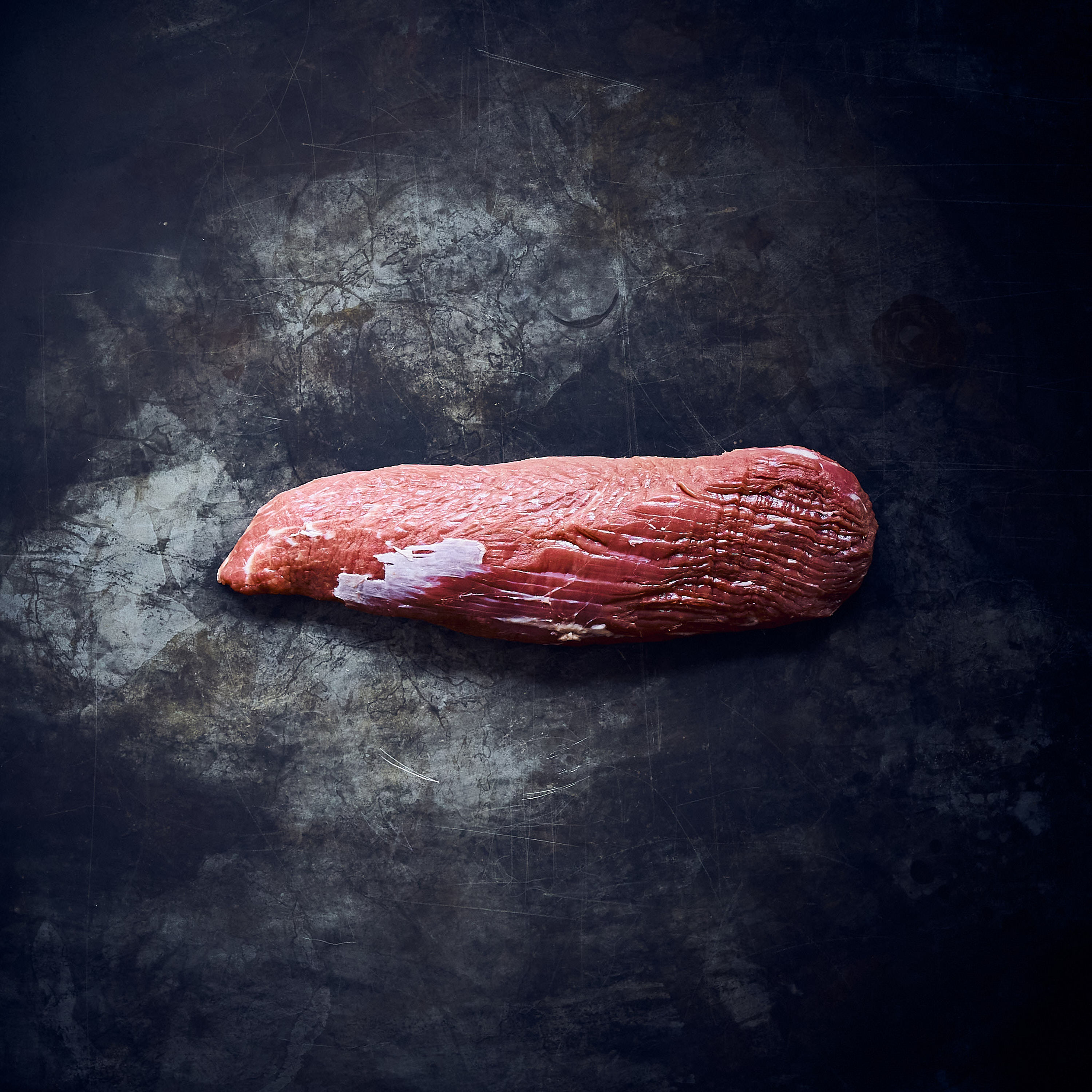 Black Label Teres Major Cut auf schwarzem Hintergrund